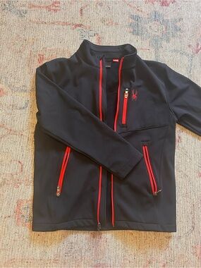 Spyder Men’s Black Softshell Jacket with Red Zippers